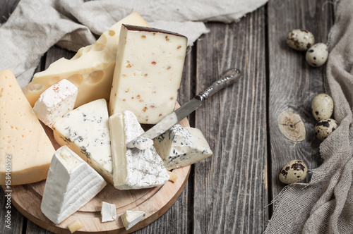 arrangement of gourmet cheeses