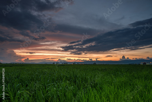 Dramatic sunset over a field