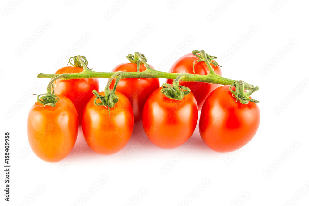 Cherry tomatoes isolated over white background close. Cherry tomatoes isolated over white background close.