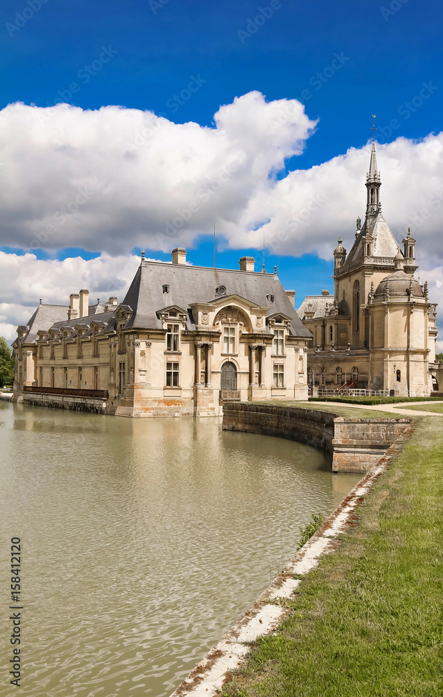 The castle of Chantilly is historical and architectural monument, France.