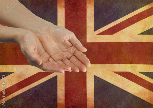 Obraz na płótnie Give your Country your Support  - Female hands in open gesture against a rustic