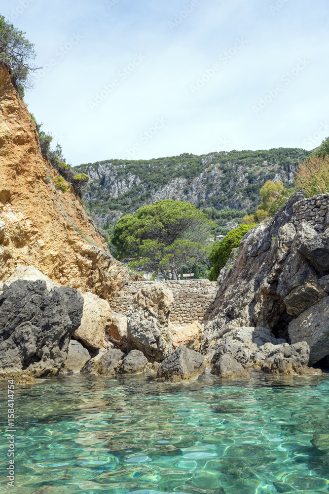 View of the Ionian Sea coast in Paleokastritsa resort. Corfu Island, Greece