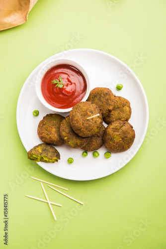 hara bhara kabab or green peas pakode, favourite indian starter menu or snacks photo