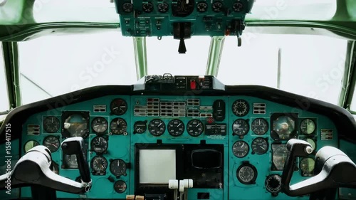Old passenger plane cockpit dashboard of flight instruments interior view 4k