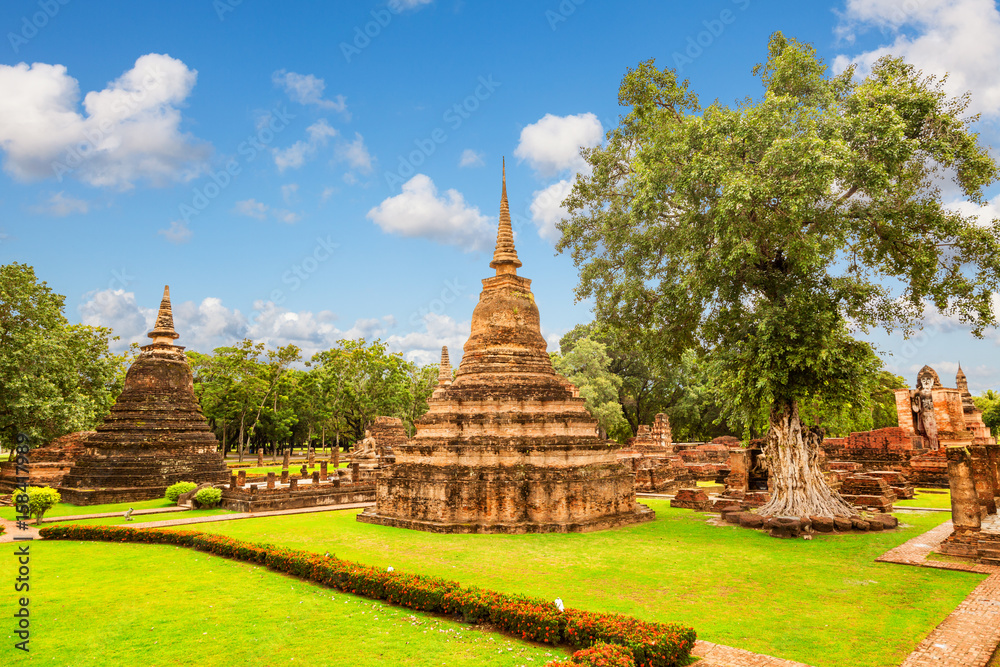 Stupas of Wat Mahathat (temple) in Sukhothai Historical Park, Thailand. Unesco World Heritage Site