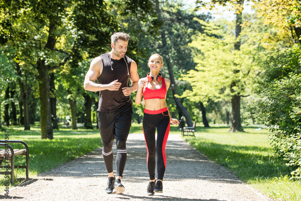 Couple training together outdoor.