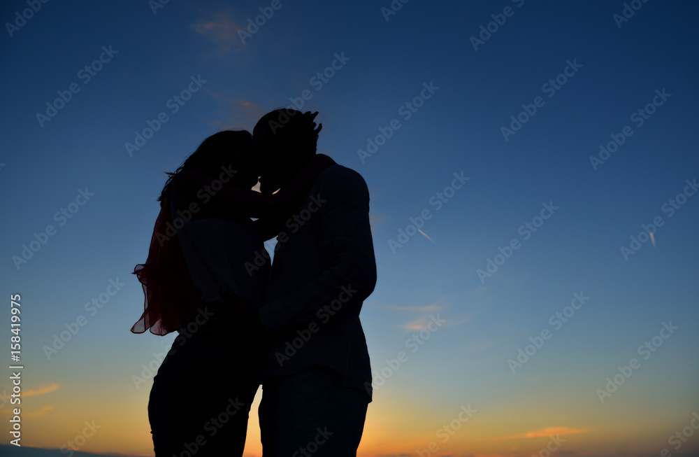 Silhouette of Lovely Couple at the beach