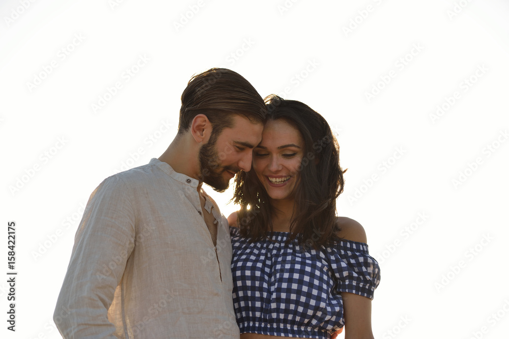 happy couple waling on the beach and having fun happy couple waling on the beach and having fun