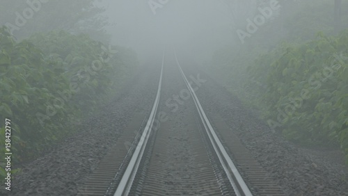 濃霧に霞む鉄路