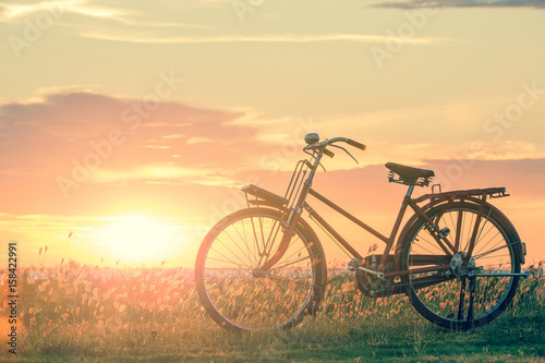 bicycle silhouette at the sunset or sunrise