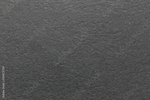 Texture of black cardboard.