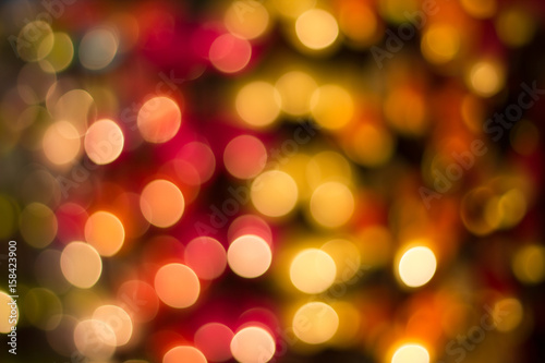 Blur - bokeh Decorative outdoor string lights hanging on tree in the garden