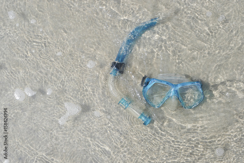 Blue Snorkel on the beach.