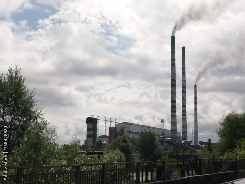 Thermal power plants. Pipes are emitting smoke in the air. Thermal power plants. Pipes are emitting smoke in the air.