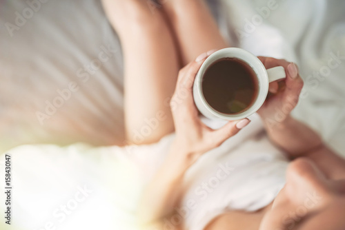 Charming young woman at home