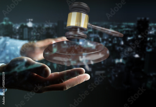 Businessman with justice hammer 3D rendering