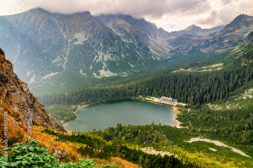 Mountainous landscape with glacial lake in the valley in the High Tatras National Park, Slovakia, Europe