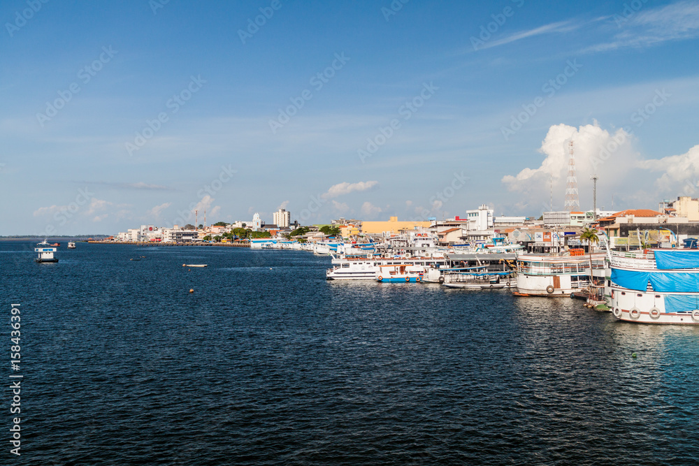 SANTAREM, BRAZIL - JULY 29, 2015: River boats anchored in Santarem, Brazil