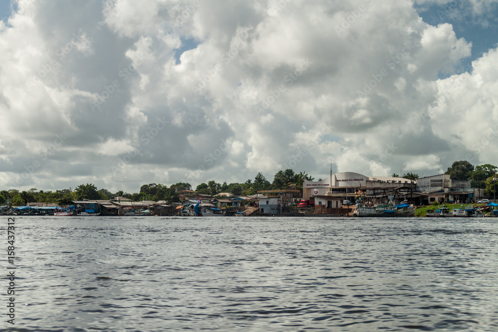 OIAPOQUE, BRAZIL -  AUGUST 1, 2015: Riverside buildings of Oiapoque town on Oiapok (Oiapoque or Oyapock) river.