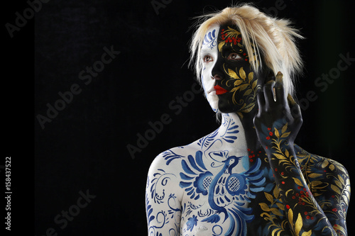 Obraz na plátně Body art of a girl in the style of Khokhloma and Gzhel