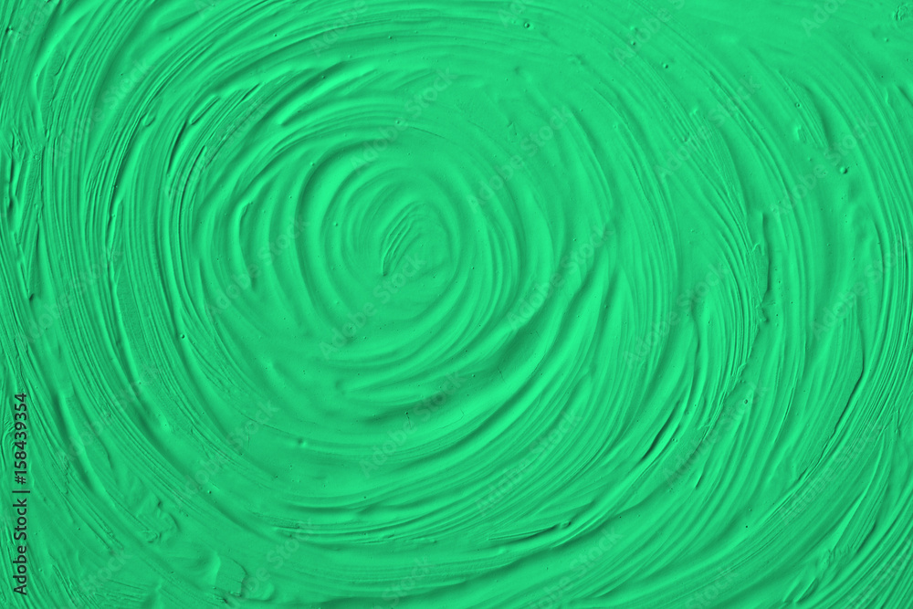 The texture of the paint is green. Background with divorce circles. Infinity in turquoise colors. The texture of the paint is green. Background with divorce circles. Infinity in turquoise colors.