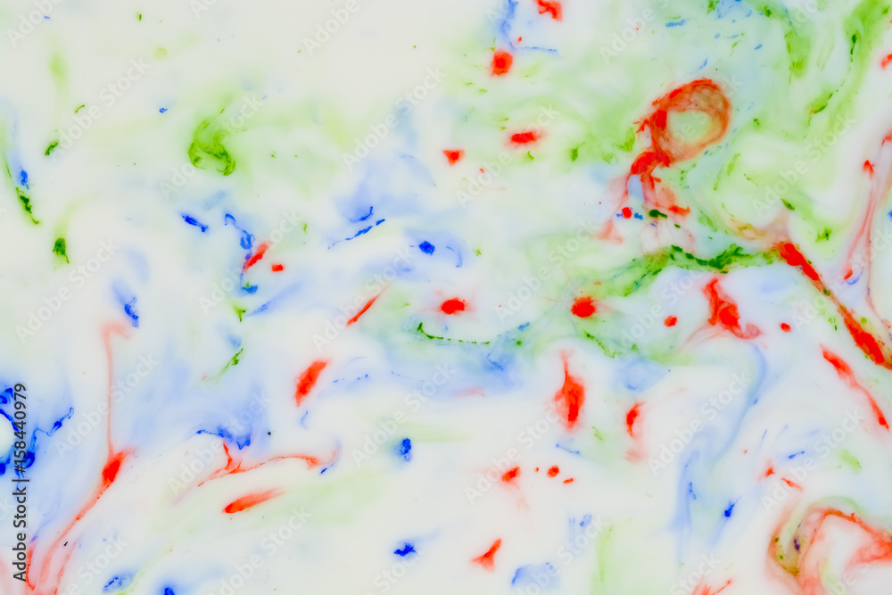 Fototapeta premium Background of watercolor mixed in milk