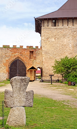 Old Cossack cross in Medzhybizh castle, Ukraine. Medzhybizh Castle, built as a bulwark against Ottoman expansion in the 1540s photo