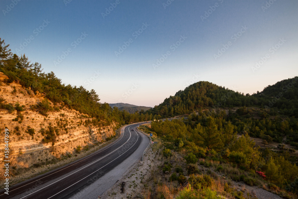 Fototapeta premium Winding Road at Sunset