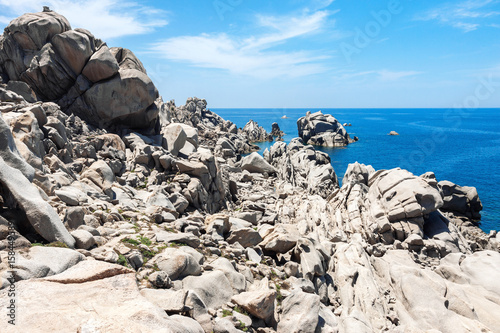 Natural rock formations on the sea cost in CapoTesta, Sardinia, Italy photo