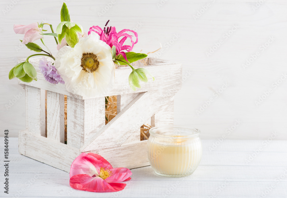 Wooden box with poppy and flowers