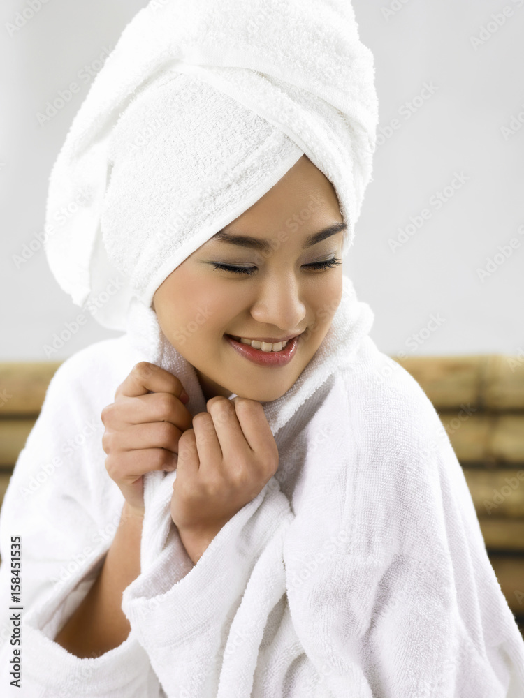 Beautiful asian girl wrap in towel and towelling Beautiful asian girl wrap in towel and towelling