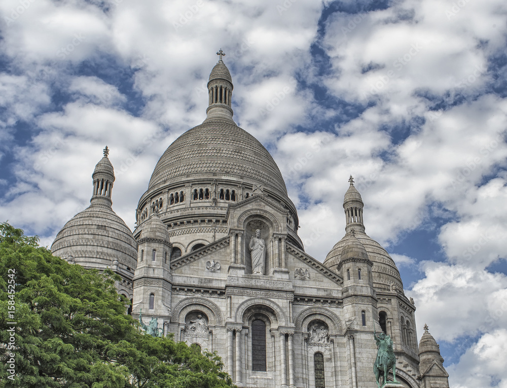 Paris Montmartre view with blue sky and clouds