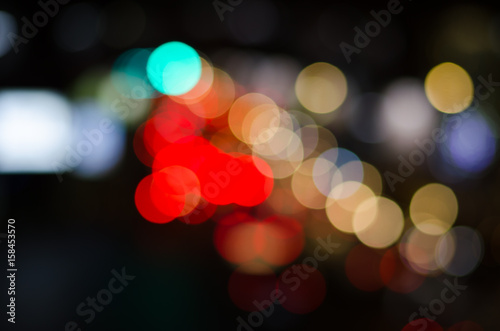 Bokeh street light background in night..colorful bokeh light from night traffic. bokeh of car in city at night.