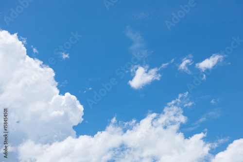 Blue sky with white cloud. Natural cloudscape background
