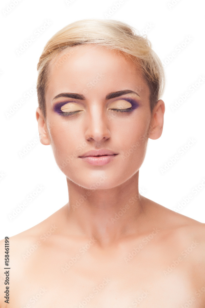 Beautiful woman with professional make up over white background in studio photo Beautiful woman with professional make up over white background in studio photo