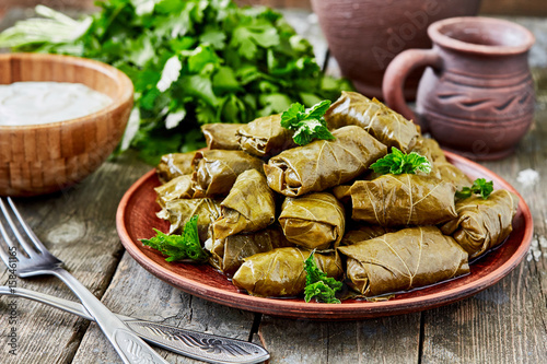 Dolma(tolma, sarma) - stuffed grape leaves with rice and meat. Traditional Caucasian, Ottoman, Turkish and Greek cuisine