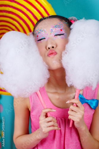 funny Korean girl with big cotton candy photo