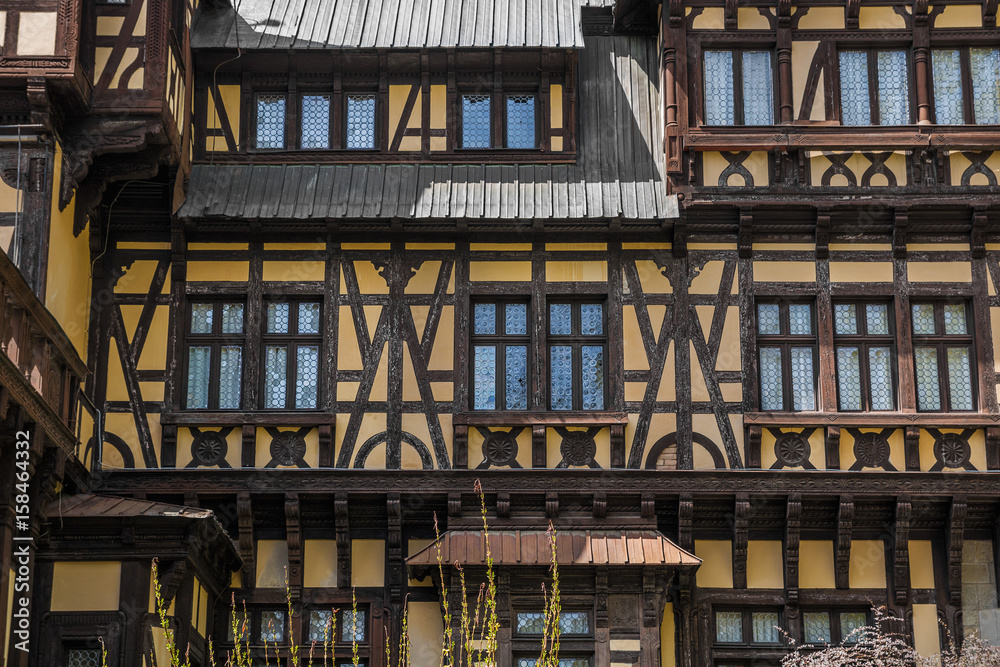 Pelisor castle in Sinaia, Romania - detail from the facade of the castle. Discover Romania concept. Pelisor castle in Sinaia, Romania - detail from the facade of the castle. Discover Romania concept.