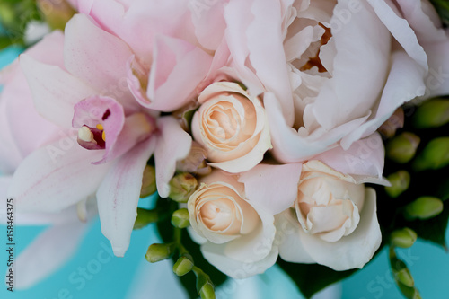 The bride s bouquet of soft pink peonies and white roses . Wedding floristry. Classic form