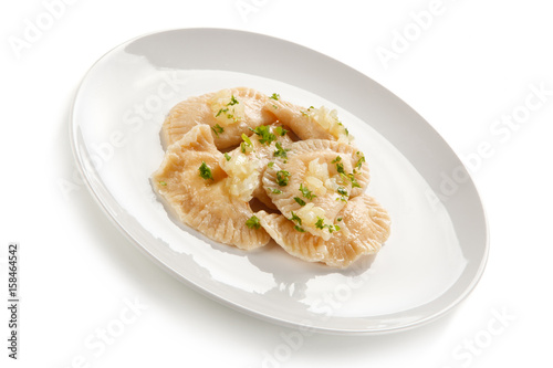Dumplings - stuffed cheese noodles on white background