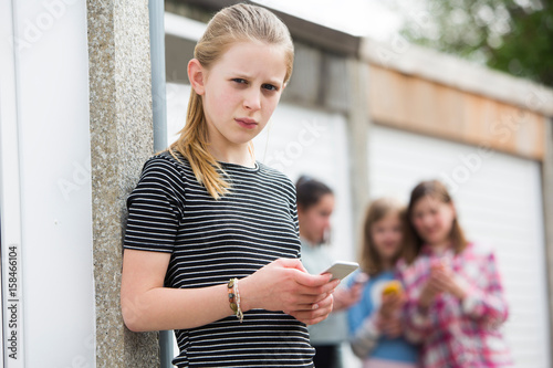 Pre Teen Girl Being Bullied By Text Message photo