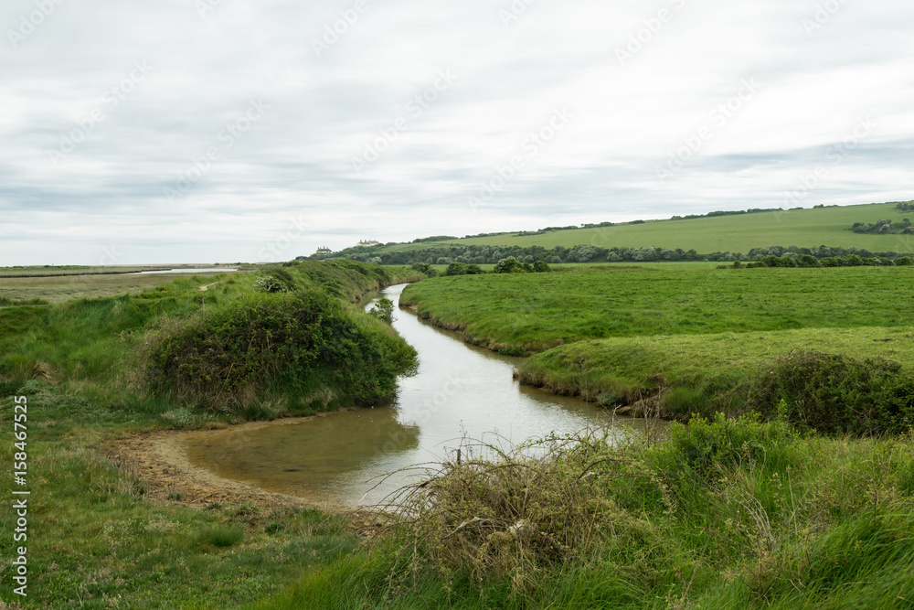 Paesaggio inglese - Foce del fiume Cuckmere Paesaggio inglese - Foce del fiume Cuckmere
