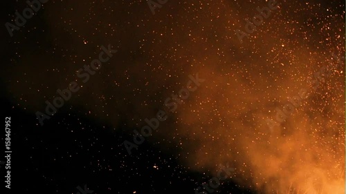 Glittering stars on bokeh background sparks of bonfire night photo