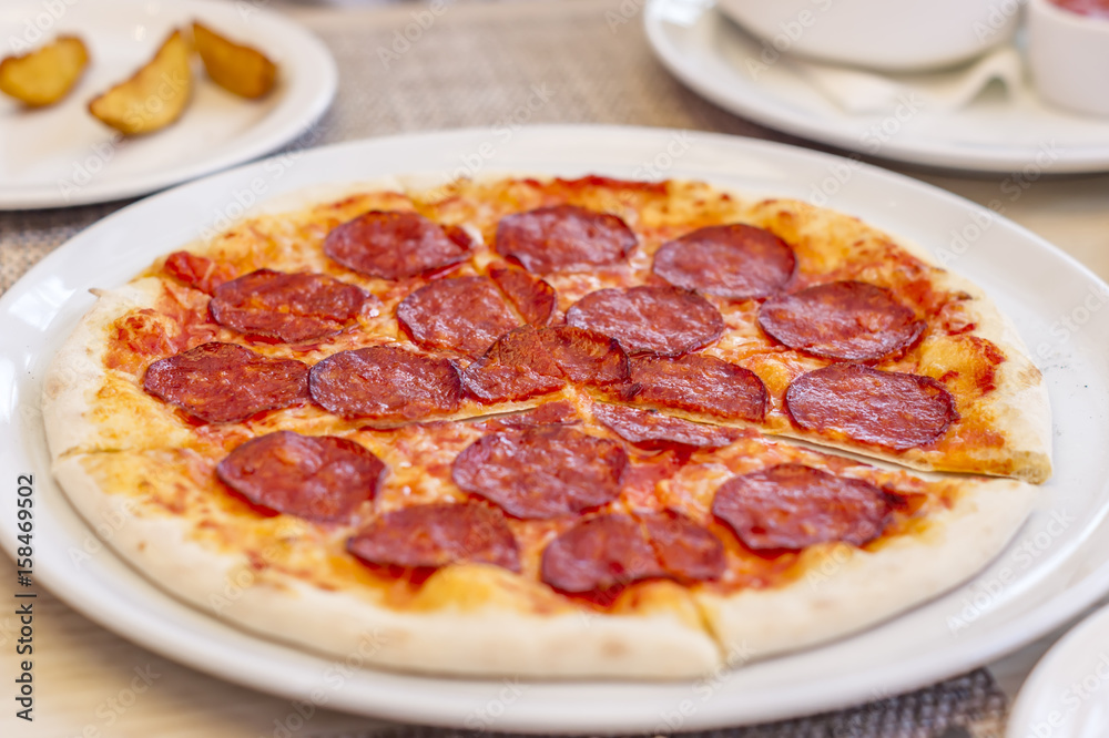 pepperoni pizza, selective focus.