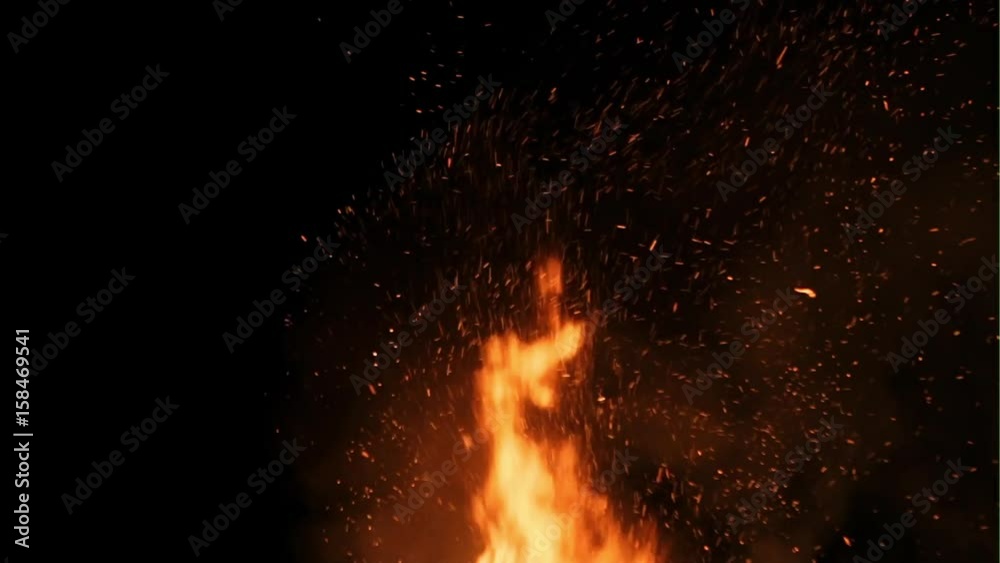 Fire flames with sparks on a black background Fire flames with sparks on a black background