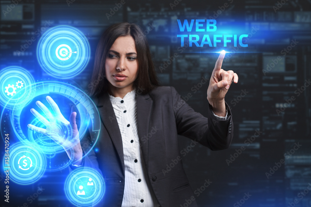 The concept of business, technology, the Internet and the network. A young entrepreneur working on a virtual screen of the future and sees the inscription: Web traffic The concept of business, technology, the Internet and the network. A young entrepreneur working on a virtual screen of the future and sees the inscription: Web traffic