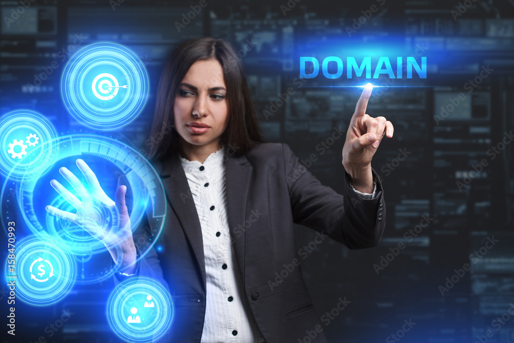 The concept of business, technology, the Internet and the network. A young entrepreneur working on a virtual screen of the future and sees the inscription: Domain The concept of business, technology, the Internet and the network. A young entrepreneur working on a virtual screen of the future and sees the inscription: Domain
