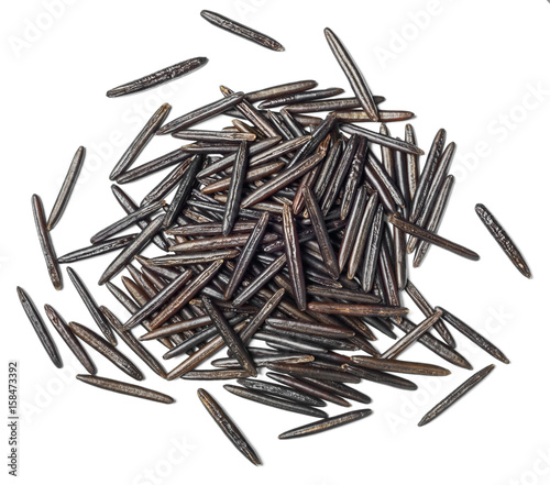 uncooked black wild rice on white, top view