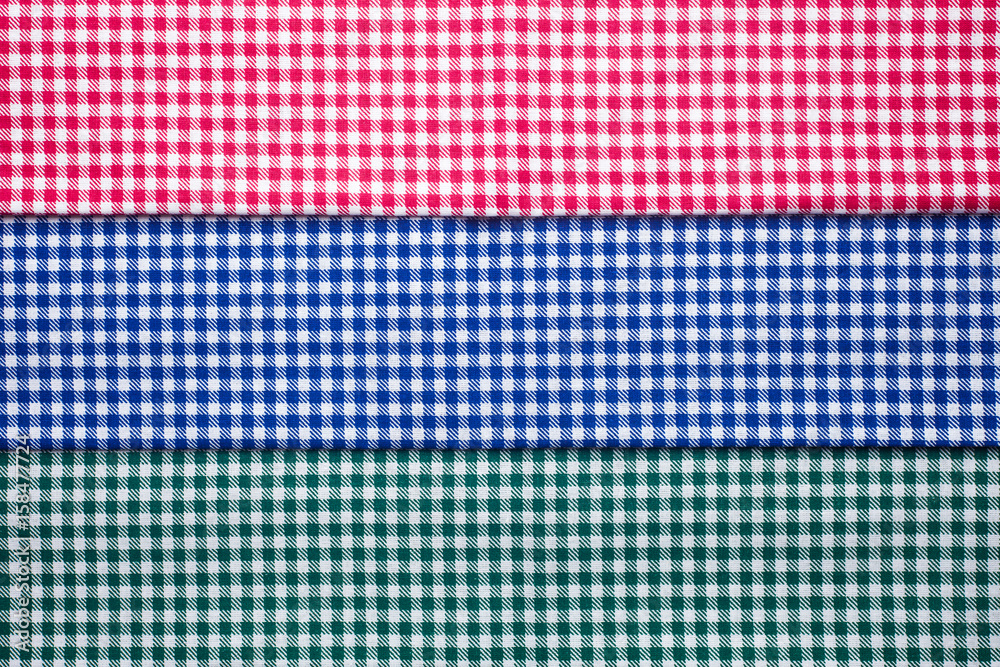 A set of napkins in a colored cage, red, blue, green A set of napkins in a colored cage, red, blue, green