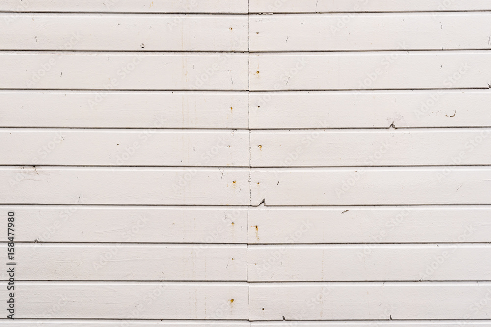 Dirty, old weathered white outside wooden plank wall. Dirty, old weathered white outside wooden plank wall.